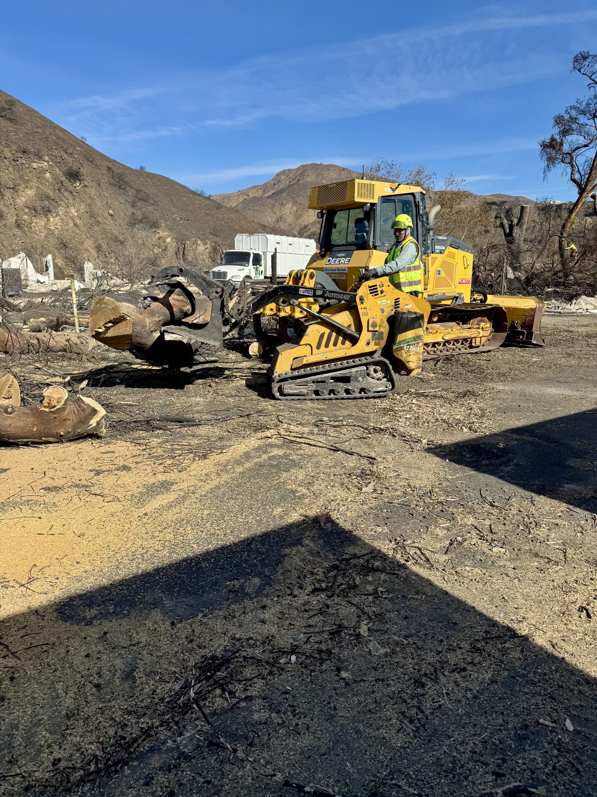 Heavy equipment used for post-fire brush clearance and debris removal in Los Angeles